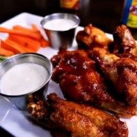 Honey Chipotle Wings · Sweet and spicy served with carrot and celery sticks.