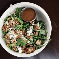 Arugula Salad · Goat cheese and candied walnuts.