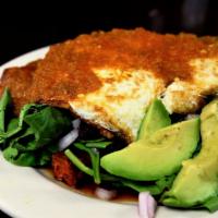 Caveman Hash Salad · Crispy sweet potato hash, spinauch, avocado, black beans, Spanish onions and 2 fried eggs wi...