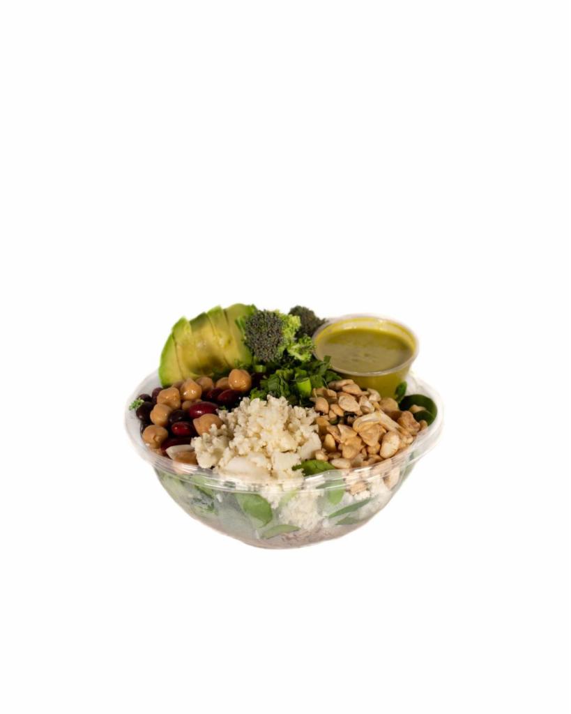 Pacific · Ancient Grains (quinoa, buckwheat, long grain black wild rice) topped with baby spinach, black beans, avocado, broccoli, cauliflower, green onion, cilantro, cashews. Served with Miso Dressing