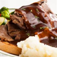 Mel's Hot Roast Beef Sandwich · Fresh sliced. Served with homemade gravy, Mel's own lumpy mashed potatoes and veggies.