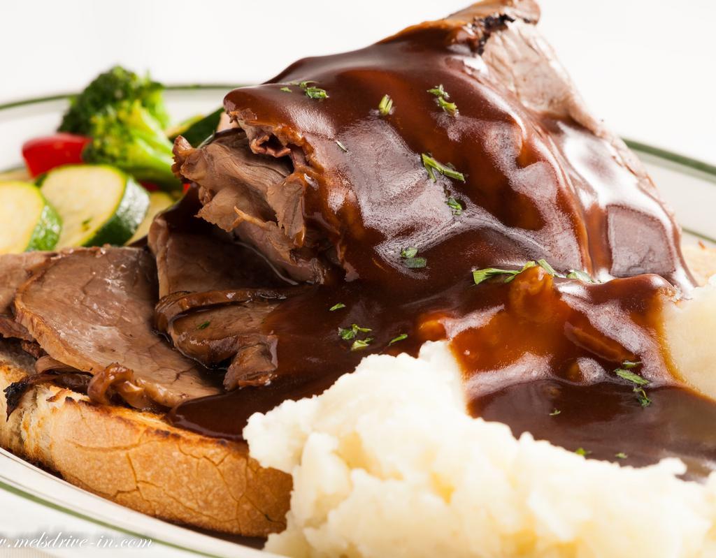 Mel's Hot Roast Beef Sandwich · Fresh sliced. Served with homemade gravy, Mel's own lumpy mashed potatoes and veggies.