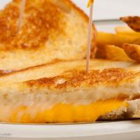 Grilled Cheese Combination · Jack, Swiss and cheddar cheeses on sourdough. Served with fries. 
Vegetarian.