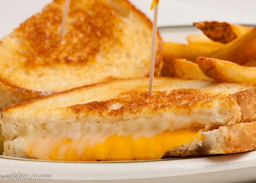 Grilled Cheese Combination · Jack, Swiss and cheddar cheeses on sourdough. Served with fries. 
Vegetarian.