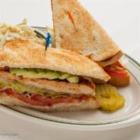 Charbroiled Chicken Breast Sandwich · Boneless, skinless tender chicken breast marinated with spices, lettuce, tomato, mayo, red o...