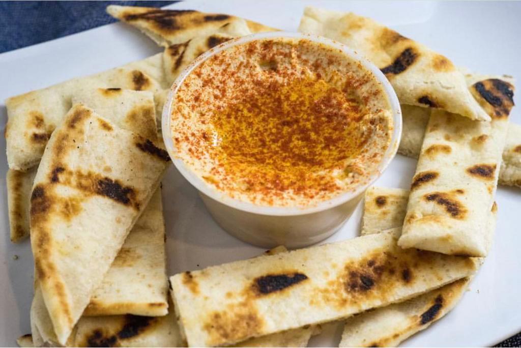 Hummus with Pita · Fresh Hummus made in-house with a side of pita bread.