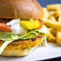 Wild Alaskan Salmon Burger · Wild Alaskan Salmon patty, char-grilled, served on a Brioche bun, with ketchup, mayo, lettuc...