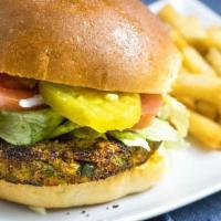 Veggie Burger · Veggie patty made from carrots, peas, broccoli and spinach, served on a Brioche bun, with ke...
