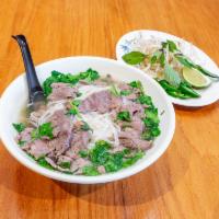Beef Pho Noodle Soup · Comes with sliced beef, rice noodles, cilantro, basil, green onion, jalapeño, lime, bean spr...