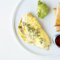 Ranchero Omelet · pepper jack cheese, mushrooms, onions, bell peppers, avocado smash, ranchero salsa with toas...