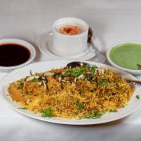 2. Murgh Biryani · Boneless chicken cooked with saffron basmati rice, marinated with herbs, spices and nuts. Se...