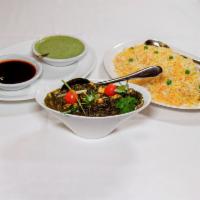9. Palak Paneer · Homemade farmer's cheese cubes and spinach cooked in a green herbs and spices