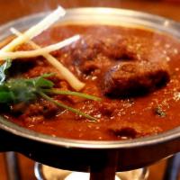 5. Rogan Josh · Fresh chunks of leg of lamb simmered to perfection in a creamy sauce with a tinge of cinnamo...