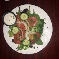 Garden Salad · Lettuce, tomatoes, onion, cucumber, and house dressing