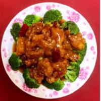 General Tso's Chicken · Chunk of chicken breaded and deep-fried in an amazing sweet spicy sauce beded with fresh veg...