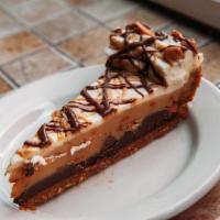 Chocolate Peanut Butter Pie · The Popular Candy Bar in a Pie. Dark Chocolate and Peanut Butter Mousse full of Reese's Pean...