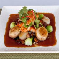 Seafood Combo · Grilled jumbo shrimp, scallop, salmon, bok choy, shitake mushroom with mushroom sauce.