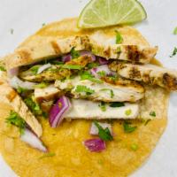 Grilled Chicken Taco · Cilantro, onion, and lime.