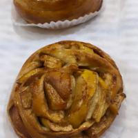 Apple Cinnamon Roll · Fresh Granny smith apples! Glazed in honey lemon. Our most popular sweet Piroshky!