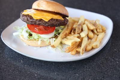 Cheeseburger · Topped with choice of hot pepper, American, monterey jack or smoked cheddar cheese. Served with lettuce, tomato, onion and pickles.