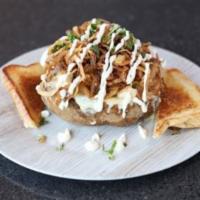 Tex Mex Chicken Potato Dinner · Loaded with mesquite grilled chicken and cheese, topped with onion straws, cilantro and sour...
