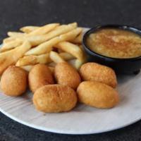 Prairie Pups · Mini breaded corn dogs served with applesauce topped with cinnamon sugar and your choice of ...