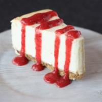 Cheesecake · Enjoy a piece of our creamy cheesecake drizzled with strawberry glaze.
