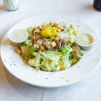 Chicken Caesar Salad · Grilled chicken, lettuce, Parmesan cheese, croutons and Caesar dressing.