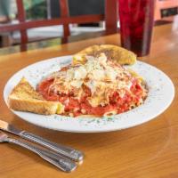 Chicken Parmesan  · Italian seasoned breaded chicken topped with marinara and mozzarella. Baked until bubbly and...