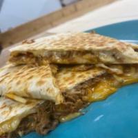 ROPA VIEJA QUESADILLA  · ROPA VIEJA QUESADILLA, SHREDDED CHEESE, SHOESTRING FRIES, AND YOUR CHOICE OF SAUCE 
