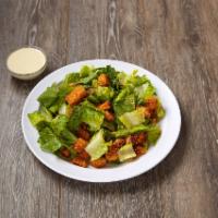 Caesar Salad · Romaine lettuce, croutons, aged Parmesan cheese, and Caesar dressing.