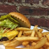 American Classic Cheeseburger · Pat LaFrieda beef patty with our signature burger sauce,  American cheese, tomato, onion, pi...