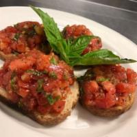 Bruschetta · Toasted bread (4 pieces) topped with chopped tomatoes, fresh basil, extra virgin olive oil a...