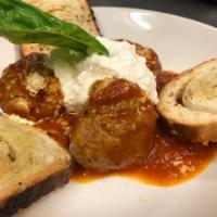 ITALIAN MEATBALLS · 100% home made beef meatballs (3pieces) served with tomato sauce, ricotta cheese and toasted...