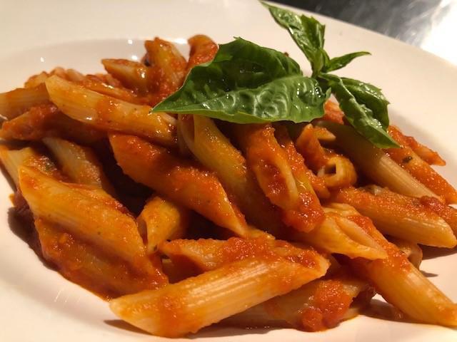 Penne Pomodoro and Basilico · Homemade tomato sauce, Parmigiano Reggiano and fresh basil.