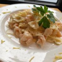 Farfalle al Limoncello · Bow tie pasta, baby shrimp, lemon zest, lemon juice and a touch of cream.