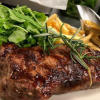 Steak and Fries · 10 oz. grilled steak from Double R ranch served with arugula and french fries.