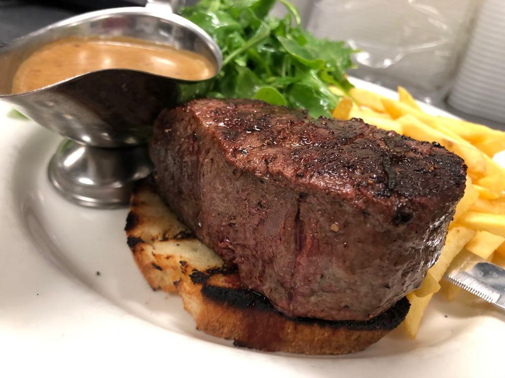 Filet Mignon Alla griglia  · 7 oz. Free range, grass fed double r ranch grilled filet mignon served with salad and french fries