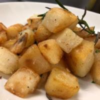 Roasted Potatoes · Roasted with rosemary.