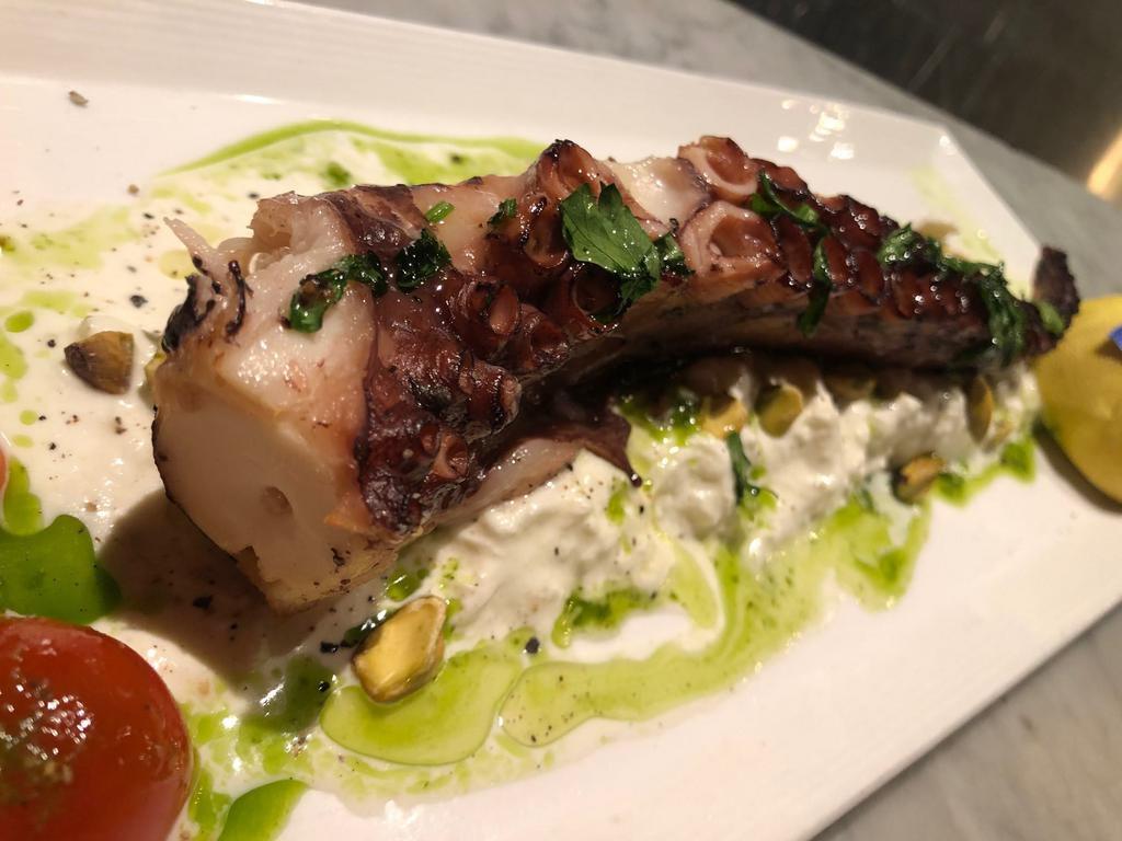 NEW GRILLED FRESH OCTOPUS WITH BURRATA · Grilled Octopus from Mediterranean served with fresh imported burrata, pesto sauce and pistachio