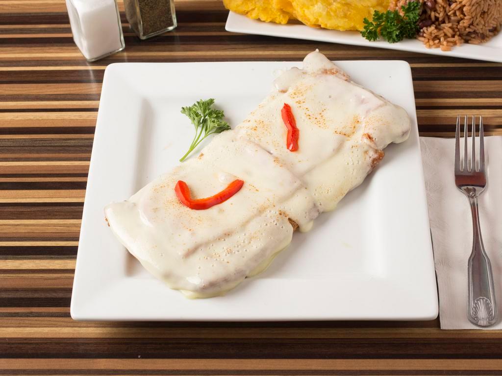 32. Milanesa de Pollo · Breaded chicken steak with cheese and ham. Served with 2 sides.