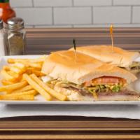 99. Pan Con Bistec Sandwich · Cuban steak and ham sandwich. Cheese will be an extra charge of 1.65 extra