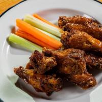 Smoked and Fried Wings · Fried crispy with your choice of sauce. Served with carrots and celery and blue cheese dress...