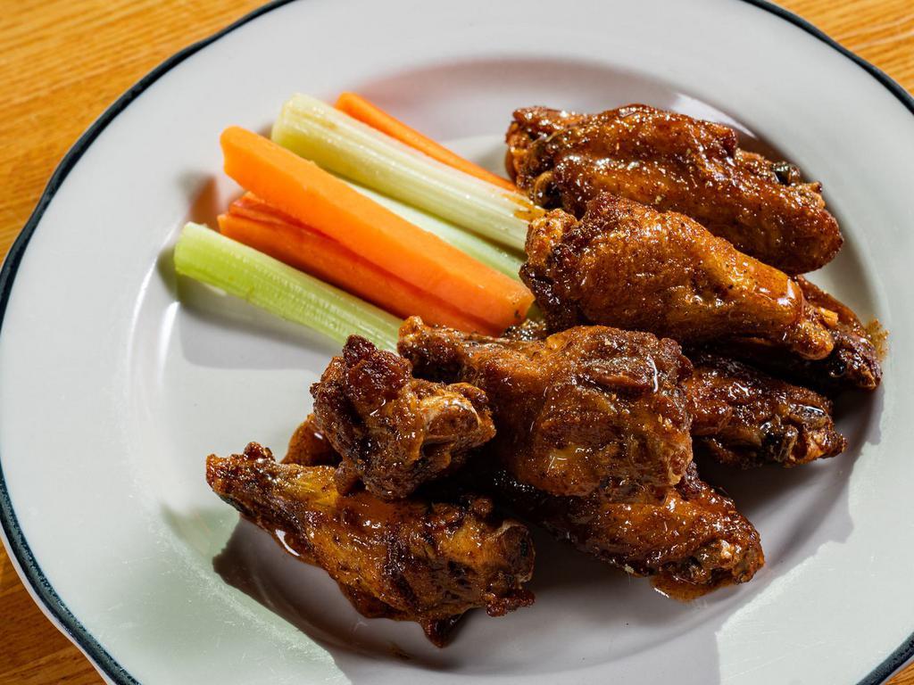 Smoked and Fried Wings · Fried crispy with your choice of sauce. Served with carrots and celery and blue cheese dressing. Gluten Free. (8 pieces)