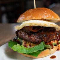 Southern Burger · Seasoned ground beef with pimento cheese, candied bacon, bbq sauce, fried egg, crisp romaine...