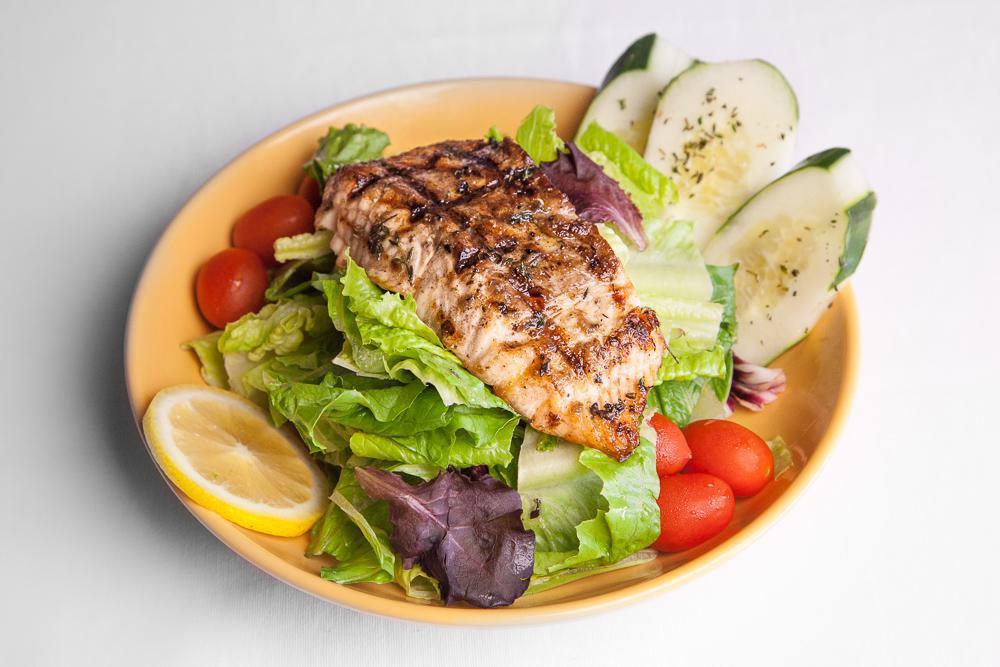 Jerk Salmon Mixed Green Salad · Mixed lettuce, tomatoes, avocado, and cucumber with honey mustard dressing.