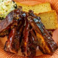 Fam Pack: BQ Ribs · Includes Cole Slaw & Corn Bread to serve 4 guests.
