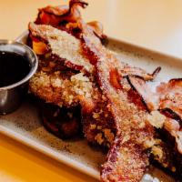When Pigs Fly · A flight sampling each of our bacons: braised pork belly, candied bacon, corn cob smoked, pe...