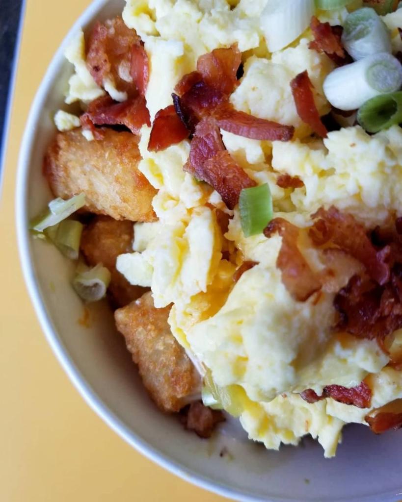 Breakfast Nachos  · Crispy golden tater tots, covered with our cheese sauce, crispy bacon, house salsa, and sour cream with choice of eggs. Gluten freee. 