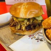 Pulled BBQ Bacon Sandy  · Pulled bacon, BBQ sauce, smoked Gouda, pickles and caramelized onions on a toasted brioche b...
